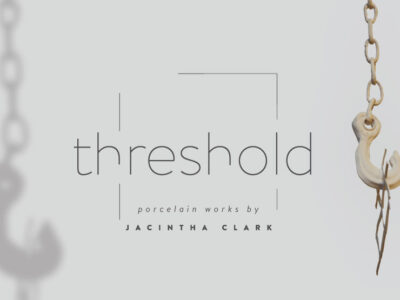 A white image with a white hook on a chain coming down on one side. Text in the middle reads "Threshold: Porcelain Works by Jacintha Clark."