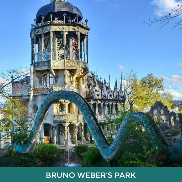 Bruno Weber’s Park. A large tower with a mosaicked serpent in front of it. 