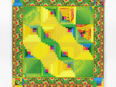 A brightly-colored, quilt-like textile by Katie Kaplan