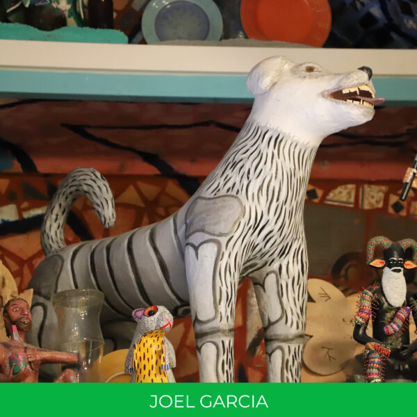 A life-size skeleton dog made of papier-mache.