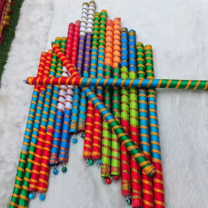 An array of sticks wrapped in colorful ribbons