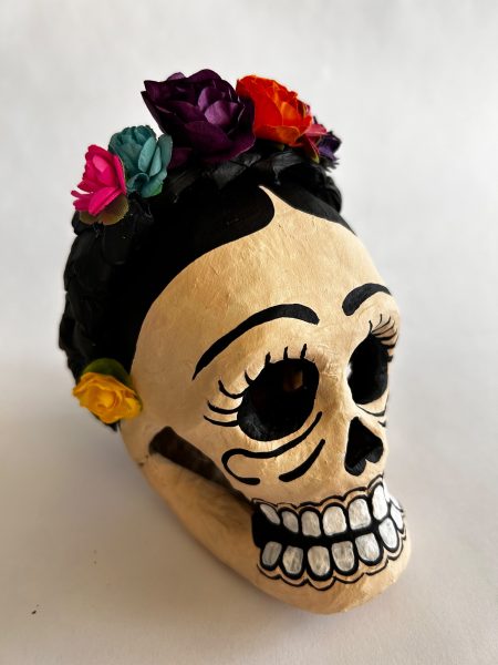 A painted papier-mache skull.