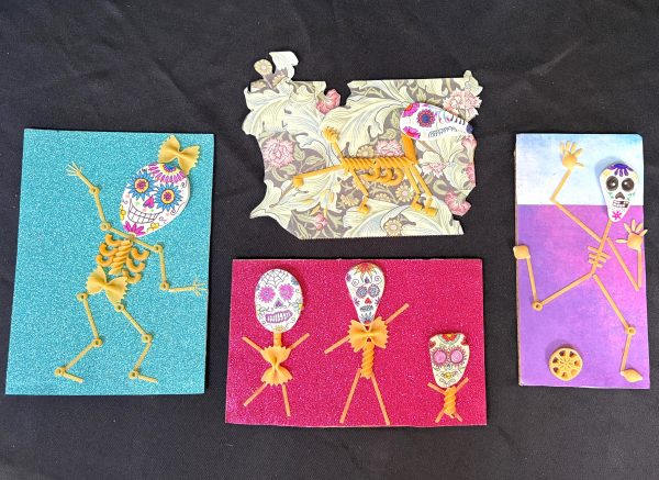 Four pieces of art which show skeletons made of pasta. The skulls are made of smooth white stones that have been brightly colored like sugar skulls. The skeletons look happy. The dog is peeing on some flowers, the family is holding hands, the woman is dancing. The boy is kicking a ball.